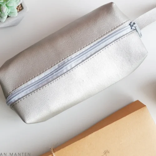 REVISI PL 18 DES (49) MAKEUP POUCH