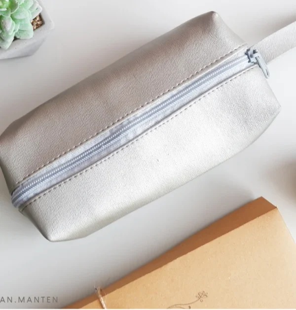 REVISI PL 18 DES (49) MAKEUP POUCH